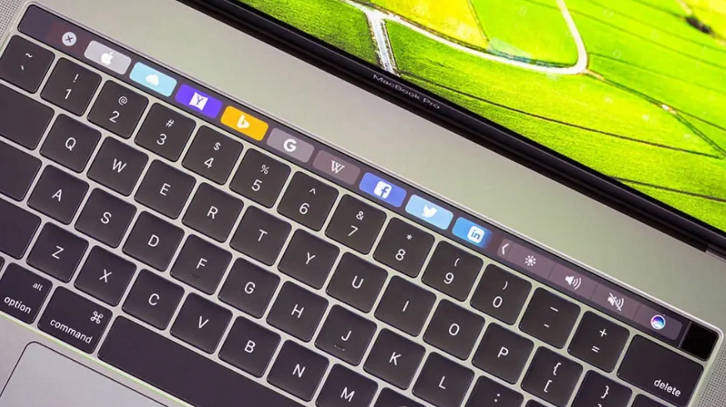 配触控屏的苹果 MacBook 专利获批,显示争议 Touch Bar 回归