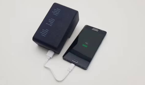 用共享单车给手机充电,英国毕业生设计出能卡在链条上的充电宝(1)